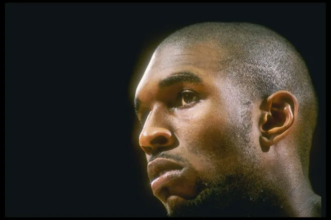 12 Mar 1997: Forward Joe Smith of the Golden State Warriors looks on during a game against the Los Angeles Lakers at the Great Western Forum in Inglewood, California. The Lakers won the game 109 - 101.
