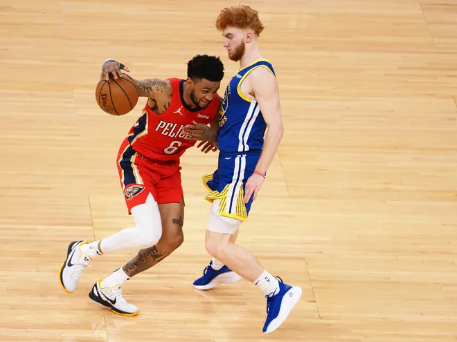 May 14, 2021; San Francisco, California, USA; New Orleans Pelicans guard Nickeil Alexander-Walker (6) drives in against Golden State Warriors guard Nico Mannion (2) during the first quarter at Chase Center. Mandatory Credit: Kelley L Cox-USA TODAY Sports