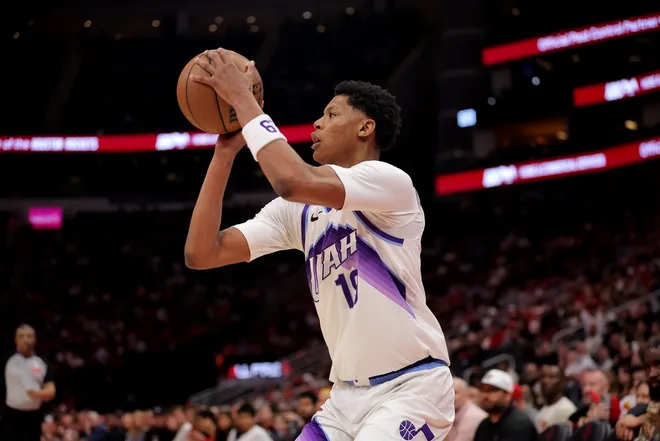 Apr 3, 2026; Houston, Texas, USA; Utah Jazz guard Ace Bailey (19) shoots outside against the Houston Rockets during the first quarter at Toyota Center.