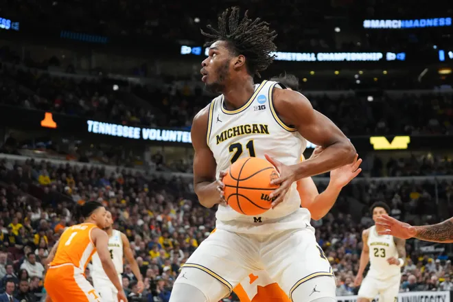Mar 29, 2026; Chicago, IL, USA; Michigan Wolverines forward Morez Johnson Jr. (21) looks to shoot in the first half against the Tennessee Volunteers during an Elite Eight game of the Midwest Regional of the men's 2026 NCAA Tournament at United Center. Mandatory Credit: David Banks-Imagn Images