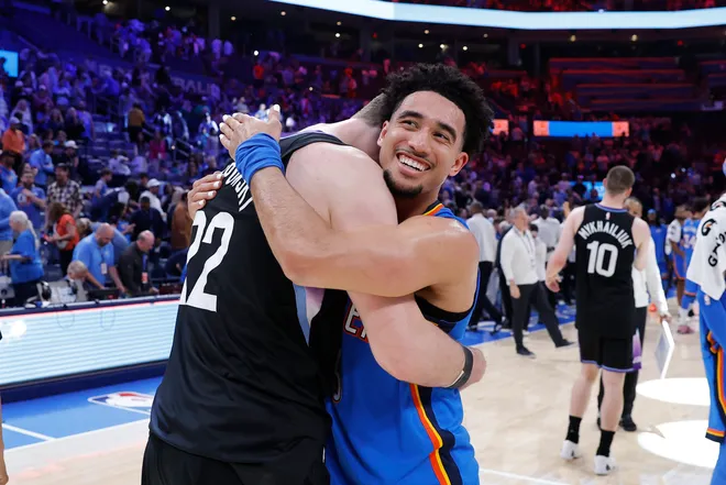 Apr 5, 2026; Oklahoma City, Oklahoma, USA; Oklahoma City Thunder guard Jared McCain (3) hugs Utah Jazz forward Kyle Filipowski (22) after their game at Paycom Center. Mandatory Credit: Alonzo Adams-Imagn Images
