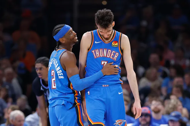 Apr 5, 2026; Oklahoma City, Oklahoma, USA; Oklahoma City Thunder guard Shai Gilgeous-Alexander (2) and center Chet Holmgren (7) laugh after a play against the Utah Jazz during the second half at Paycom Center. Mandatory Credit: Alonzo Adams-Imagn Images