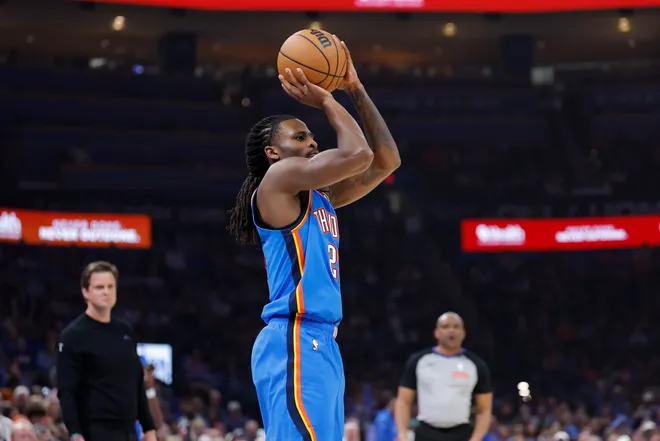 Apr 5, 2026; Oklahoma City, Oklahoma, USA; Oklahoma City Thunder guard Cason Wallace (22) shoots a three point basket against the Utah Jazz during the second quarter at Paycom Center. Mandatory Credit: Alonzo Adams-Imagn Images