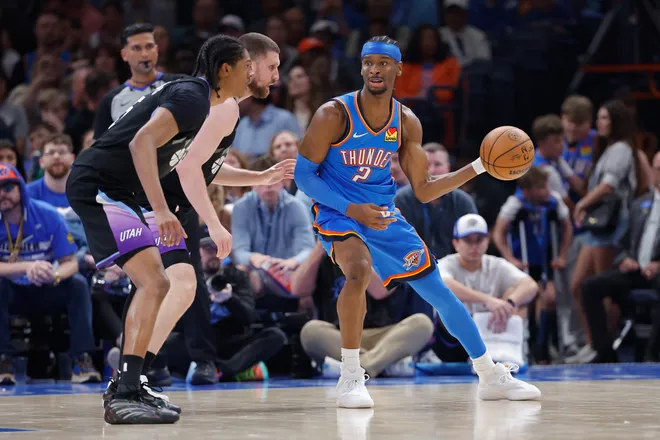 Apr 5, 2026; Oklahoma City, Oklahoma, USA; Oklahoma City Thunder guard Shai Gilgeous-Alexander (2) drives against Utah Jazz guard Svi Mykhailiuk (10) during the second half at Paycom Center. Mandatory Credit: Alonzo Adams-Imagn Images