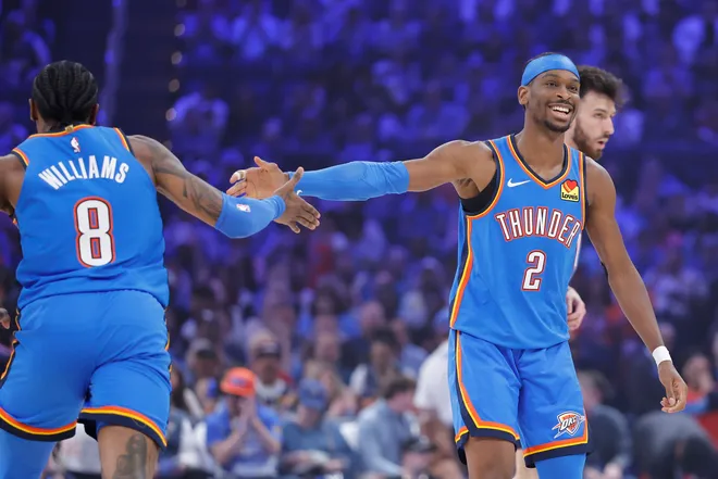 Apr 5, 2026; Oklahoma City, Oklahoma, USA; Oklahoma City Thunder guard Shai Gilgeous-Alexander (2) celebrates with Oklahoma City Thunder guard Jalen Williams (8) after scoring against the Utah Jazz during the first quarter at Paycom Center. Mandatory Credit: Alonzo Adams-Imagn Images