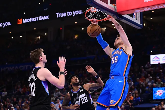 OKLAHOMA CITY, OKLAHOMA - APRIL 5: Isaiah Hartenstein #55 of the Oklahoma City Thunder dunks during the second half against the Utah Jazz at Paycom Center on April 5, 2026 in Oklahoma City, Oklahoma. NOTE TO USER: User expressly acknowledges and agrees that, by downloading and or using this photograph, User is consenting to the terms and conditions of the Getty Images License Agreement. (Photo by Joshua Gateley/Getty Images)