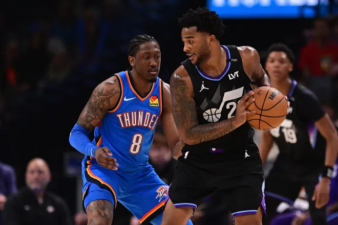 OKLAHOMA CITY, OKLAHOMA - APRIL 5: Brice Sensabaugh #28 of the Utah Jazz controls the ball against Jalen Williams #8 of the Oklahoma City Thunder during the second half at Paycom Center on April 5, 2026 in Oklahoma City, Oklahoma. NOTE TO USER: User expressly acknowledges and agrees that, by downloading and or using this photograph, User is consenting to the terms and conditions of the Getty Images License Agreement. (Photo by Joshua Gateley/Getty Images)