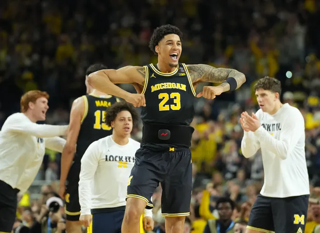 Apr 4, 2026; Indianapolis, IN, USA; Michigan Wolverines forward Yaxel Lendeborg (23) reacts against the Arizona Wildcats in the first half during a semifinal of the Final Four of the men's 2026 NCAA Tournament at Lucas Oil Stadium. Mandatory Credit: Robert Deutsch-Imagn Images