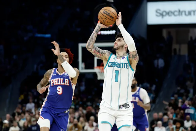 Mar 28, 2026; Charlotte, North Carolina, USA; Charlotte Hornets guard LaMelo Ball (1) attempts a jump shot during the fourth quarter against the Philadelphia 76ers at Spectrum Center. Mandatory Credit: Brian Westerholt-Imagn Images