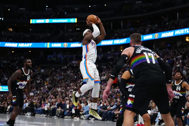 Apr 10, 2026; Denver, Colorado, USA; Oklahoma City Thunder guard Luguentz Dort (5) shoots the ball in the first quarter against the Denver Nuggets at Ball Arena. Mandatory Credit: Ron Chenoy-Imagn Images