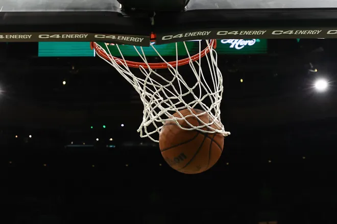 Apr 10, 2026; Boston, Massachusetts, USA; A Wilson NBA ball goes through the hoop before the game between the Boston Celtics and the New Orleans Pelicans at TD Garden. Mandatory Credit: Winslow Townson-Imagn Images