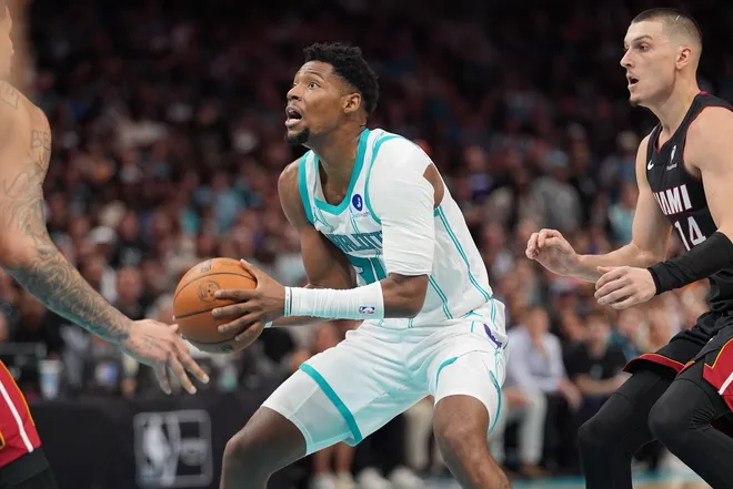 Apr 14, 2026; Charlotte, North Carolina, USA; Charlotte Hornets forward Brandon Miller (24) shoots the ball against the Miami Heat during the second half during the play-in rounds between the Charlotte Hornets and the Miami Heat of the 2026 NBA Playoffs at Spectrum Center. Mandatory Credit: Jim Dedmon-Imagn Images