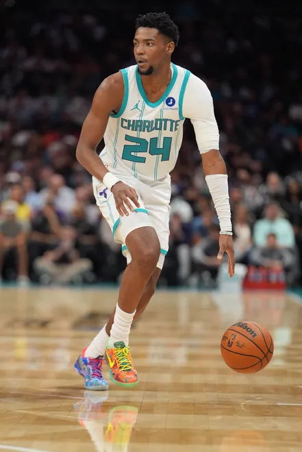Apr 14, 2026; Charlotte, North Carolina, USA; Charlotte Hornets forward Brandon Miller (24) brings the ball up court against the Miami Heat during the second half during the play-in rounds between the Charlotte Hornets and the Miami Heat of the 2026 NBA Playoffs at Spectrum Center. Mandatory Credit: Jim Dedmon-Imagn Images