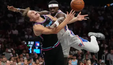 MIAMI — The agony of defeat, the agony of de-foul: Miami Heat guard Pelle Larsson, left, is fouled by Philadelphia 76ers center Adem Bona, right, during the second half of an NBA basketball game, Monday, March 30, 2026, in Miami. Photo: Lynne Sladky/AP