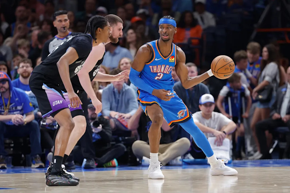 Apr 5, 2026; Oklahoma City, Oklahoma, USA; Oklahoma City Thunder guard Shai Gilgeous-Alexander (2) drives against Utah Jazz guard Svi Mykhailiuk (10) during the second half at Paycom Center. Mandatory Credit: Alonzo Adams-Imagn Images