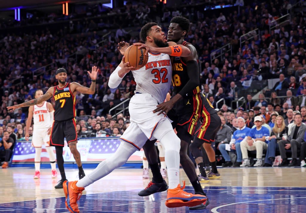 Karl-Anthony Towns drives on Mouhamed Gueye during the third quarter of the Knicks’ Game 1 win over the Hawks. Charles Wenzelberg / New York Post