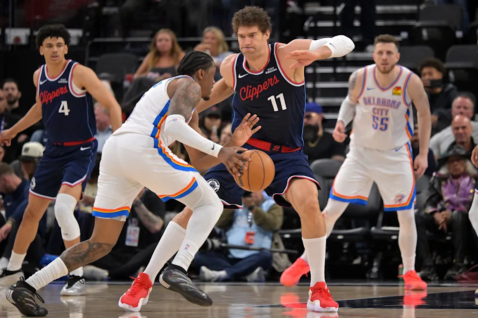 Apr 8, 2026; Inglewood, California, USA; Los Angeles Clippers center Brook Lopez (11) defends Oklahoma City Thunder guard Jalen Williams (8) in the first half at Intuit Dome. Mandatory Credit: Jayne Kamin-Oncea-Imagn Images