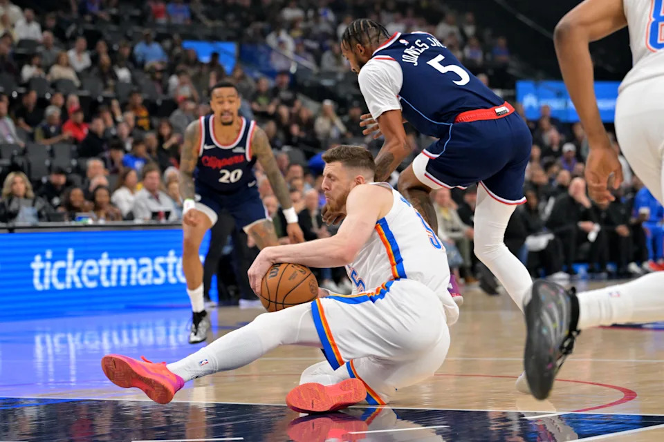 Apr 8, 2026; Inglewood, California, USA; Oklahoma City Thunder center Isaiah Hartenstein (55) beats Los Angeles Clippers forward Derrick Jones Jr. (5) to a rebound in the first half at Intuit Dome. Mandatory Credit: Jayne Kamin-Oncea-Imagn Images