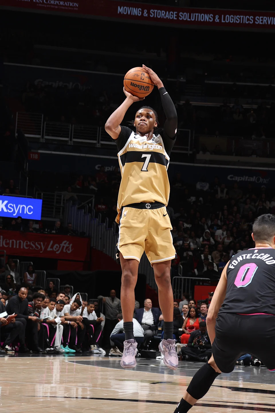 Bub Carrington shot 6-7 from three-point range in the Wizards loss to the Miami Heat. | NBAE via Getty Images