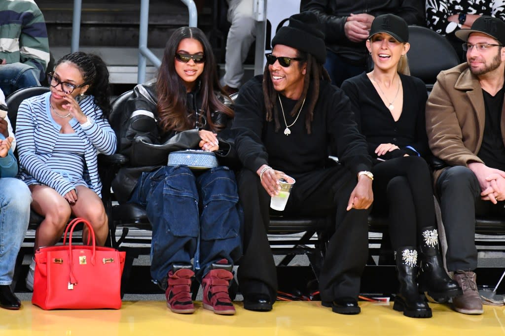 Jay-Z and his eldest daughter Blue Ivy Carter attend a Lakers game in LA. Getty Images