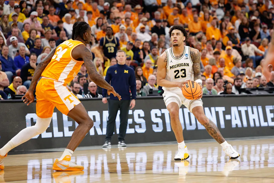 Mar 29, 2026; Chicago, IL, USA; Michigan Wolverines forward Yaxel Lendeborg (23) looks to shoot in the second half against the Tennessee Volunteers during an Elite Eight game of the Midwest Regional of the men's 2026 NCAA Tournament at United Center. Mandatory Credit: Kamil Krzaczynski-Imagn Images