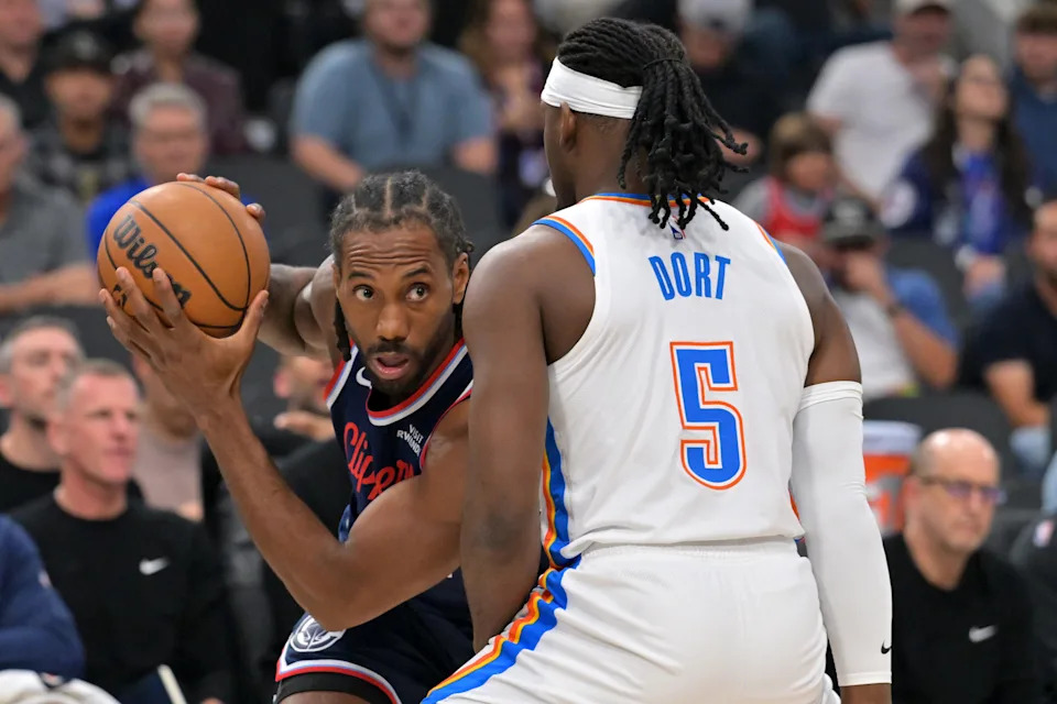 Apr 8, 2026; Inglewood, California, USA; Oklahoma City Thunder guard Luguentz Dort (5) defends Los Angeles Clippers forward Kawhi Leonard (2) in the first half at Intuit Dome. Mandatory Credit: Jayne Kamin-Oncea-Imagn Images