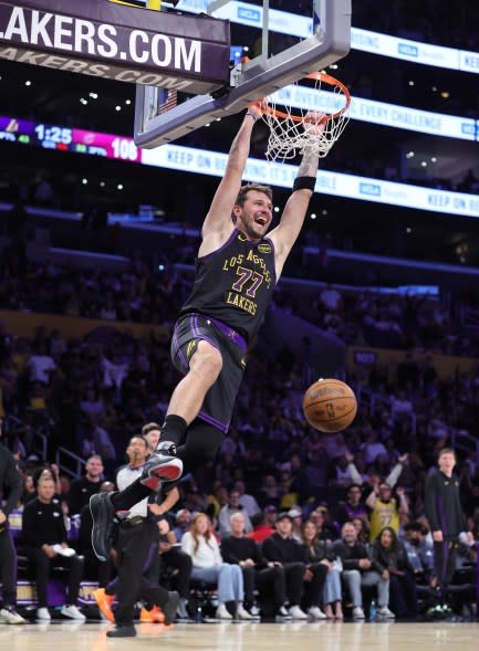 Luka Doncic of the Los Angeles Lakers makes a slam dunk against the Cleveland Cavaliers in the second half at Crypto.com Arena on March 31, 2026 in Los Angeles, California. (Photo by Ronald Martinez/Getty Images)