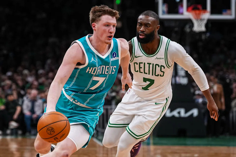 Apr 7, 2026; Boston, Massachusetts, USA; Charlotte Hornets guard Kon Knueppel (7) drives the ball against Boston Celtics guard Jaylen Brown (7) in the second half at TD Garden. Mandatory Credit: David Butler II-Imagn Images