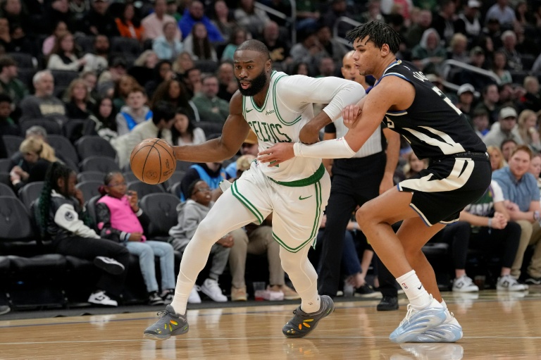Brown, Tatum fuel Celtics over Bucks, Mavs teen Flagg scores 51