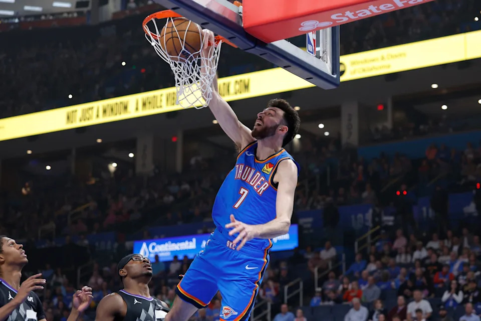 Apr 5, 2026; Oklahoma City, Oklahoma, USA; Oklahoma City Thunder center Chet Holmgren (7) dunks abasing the Utah Jazz during the first quarter at Paycom Center. Mandatory Credit: Alonzo Adams-Imagn Images