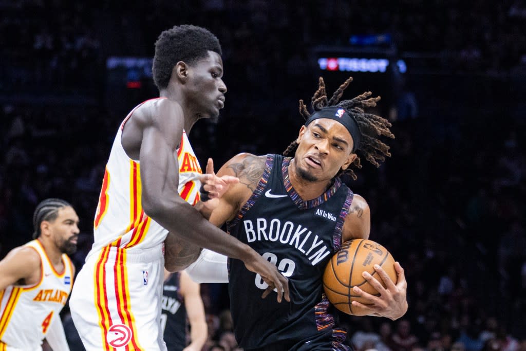 Nets center Nic Claxton (33) drives against Atlanta Hawks forward Mouhamed Gueye (18) during the first half at Barclays Center, Friday, April 3, 2026, in Brooklyn, NY. Corey Sipkin for the NY POST