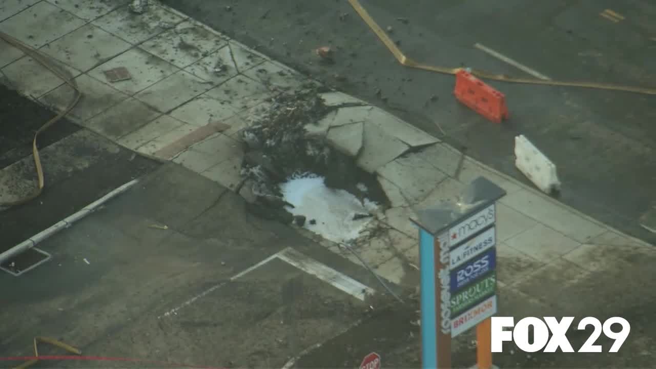 Philadelphia plane crash: Daylight aerials show crater, debris field from jet crash