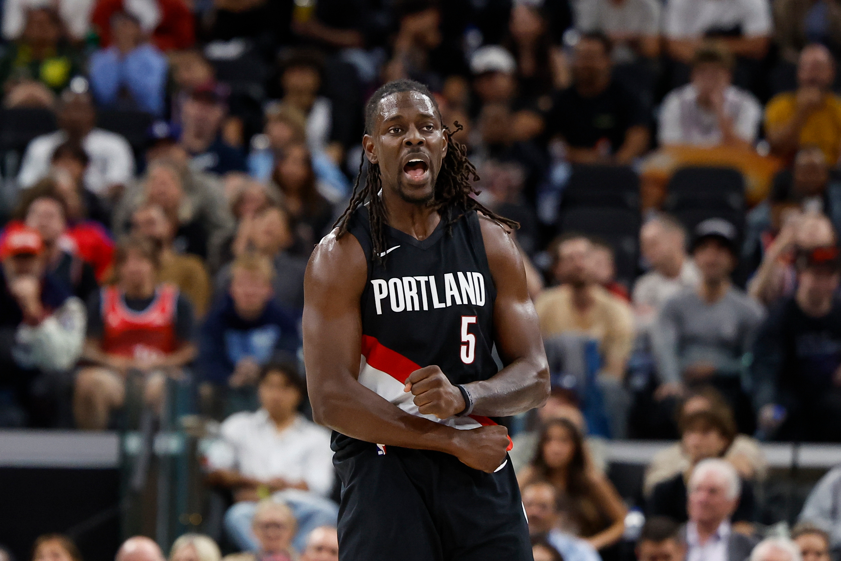 Portland Trail Blazers guard Jrue Holiday reacts after scoring during...