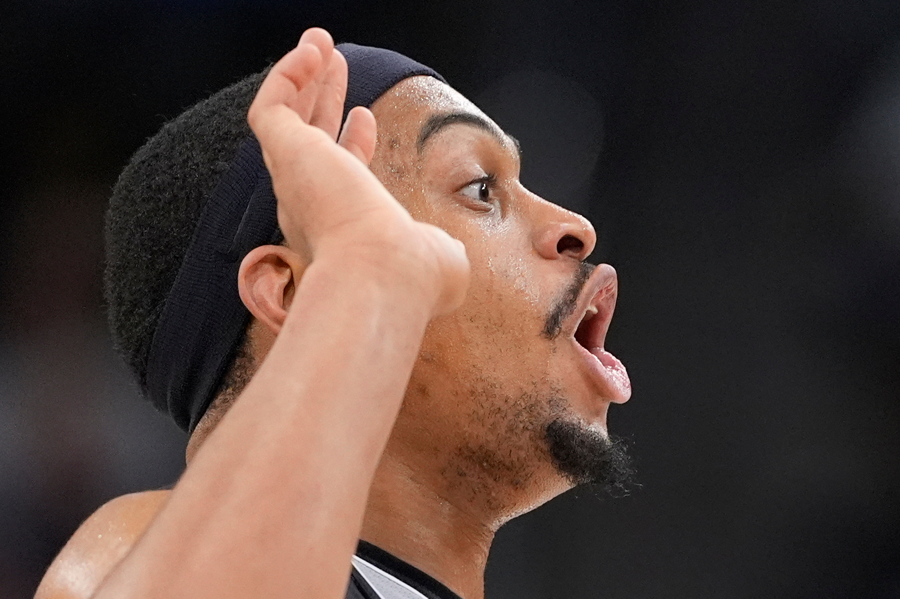San Antonio Spurs forward Keldon Johnson celebrates after scoring during...