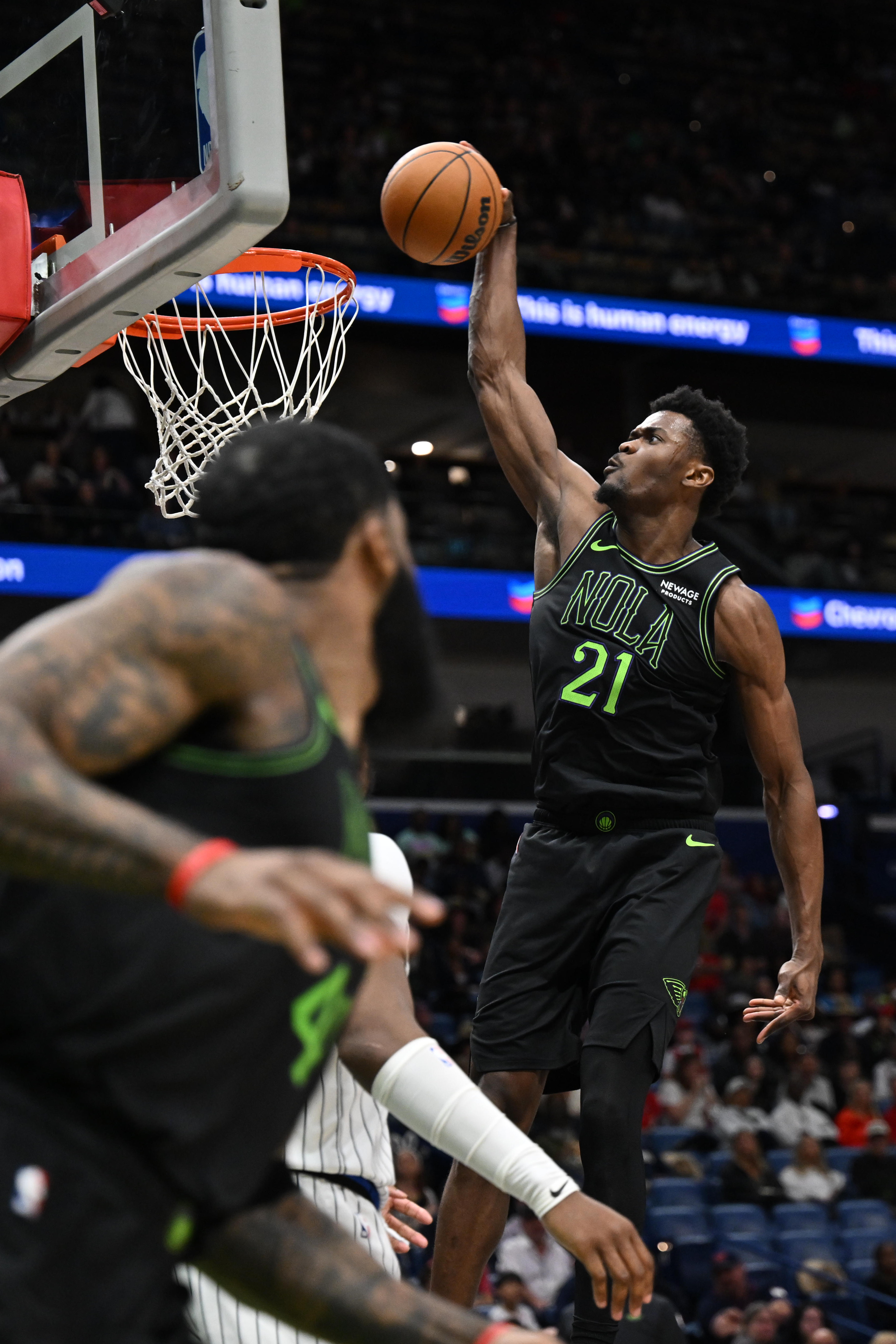 New Orleans Pelicans center Yves Missi (21) dunks in the...
