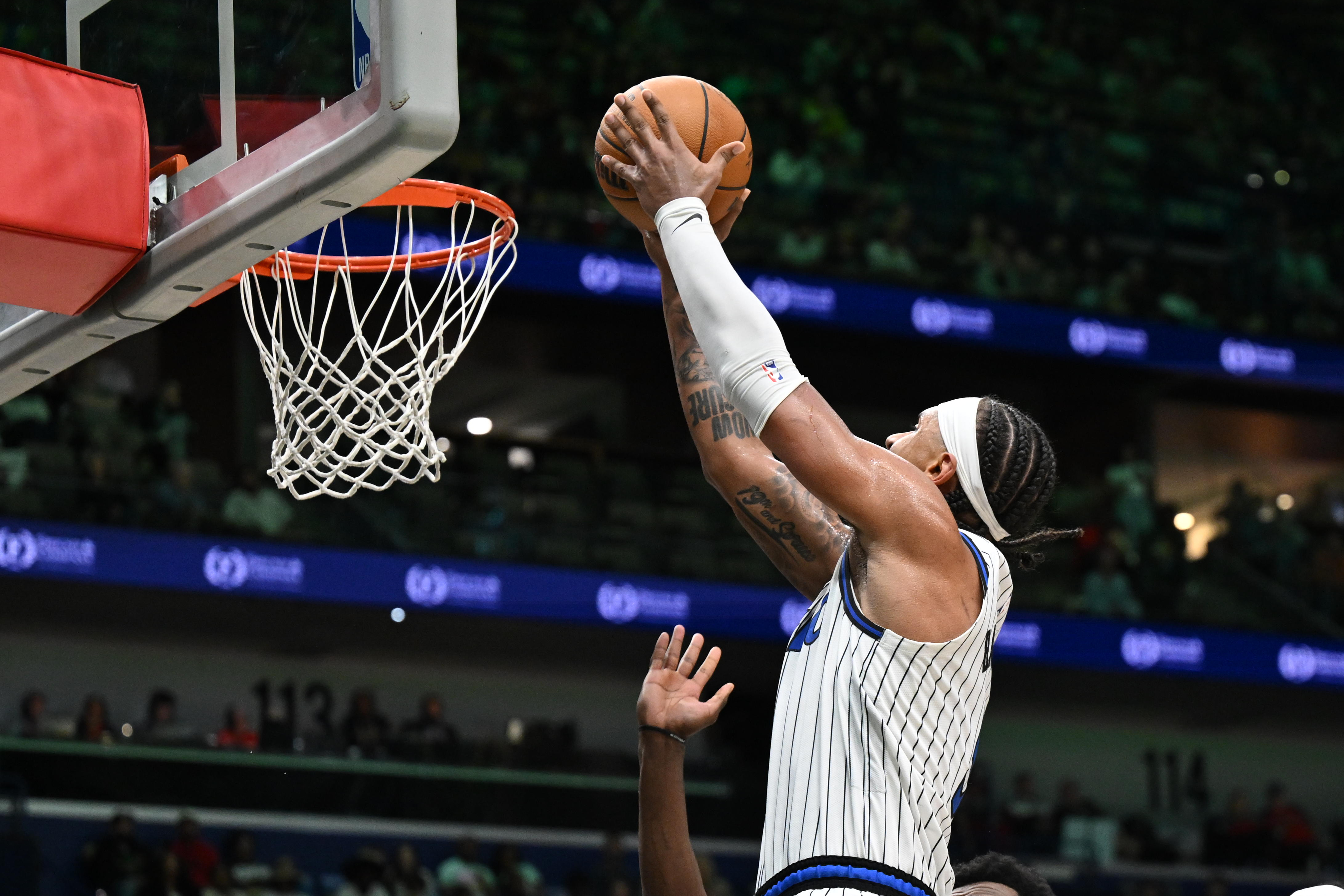 Orlando Magic forward Paolo Banchero (5) dunks in the second...