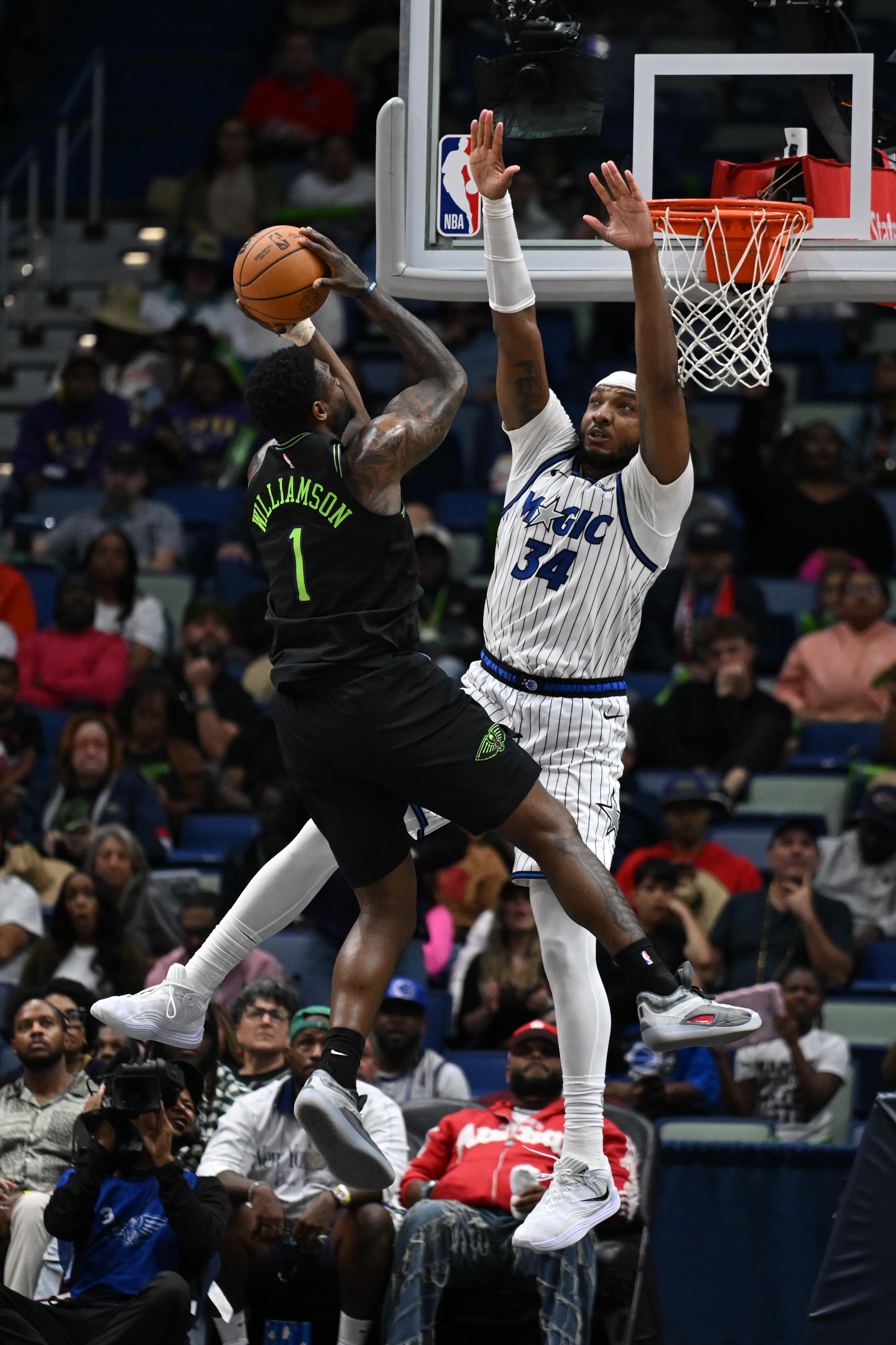 Orlando Magic center-forward Wendell Carter Jr. (34) blocks New Orleans...