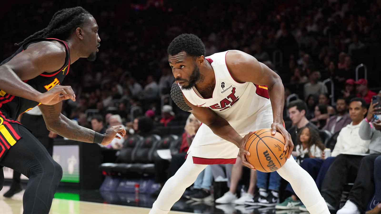 Miami Heat forward Andrew Wiggins (22) looks to drive against Atlanta Hawks guard Keaton Wallace (2) during the second half at Kaseya Center. 