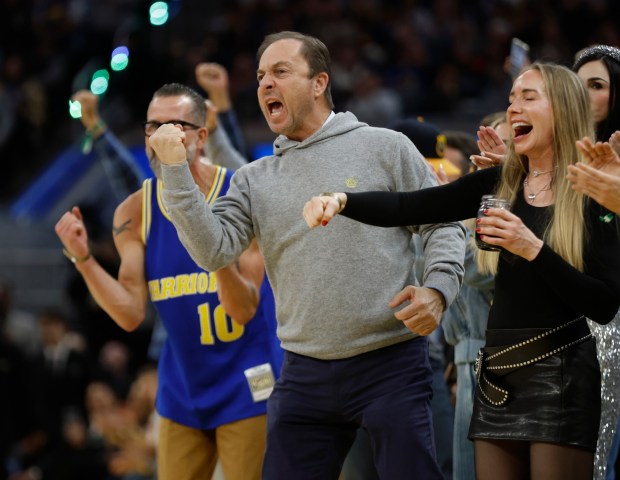 Golden State Warriors majority owner Joe Lacob celebrates a basket against the Toronto Raptors in the third quarter at the Chase Center in San Francisco, Calif., on Tuesday, Jan. 20, 2026. (Nhat V. Meyer/Bay Area News Group)