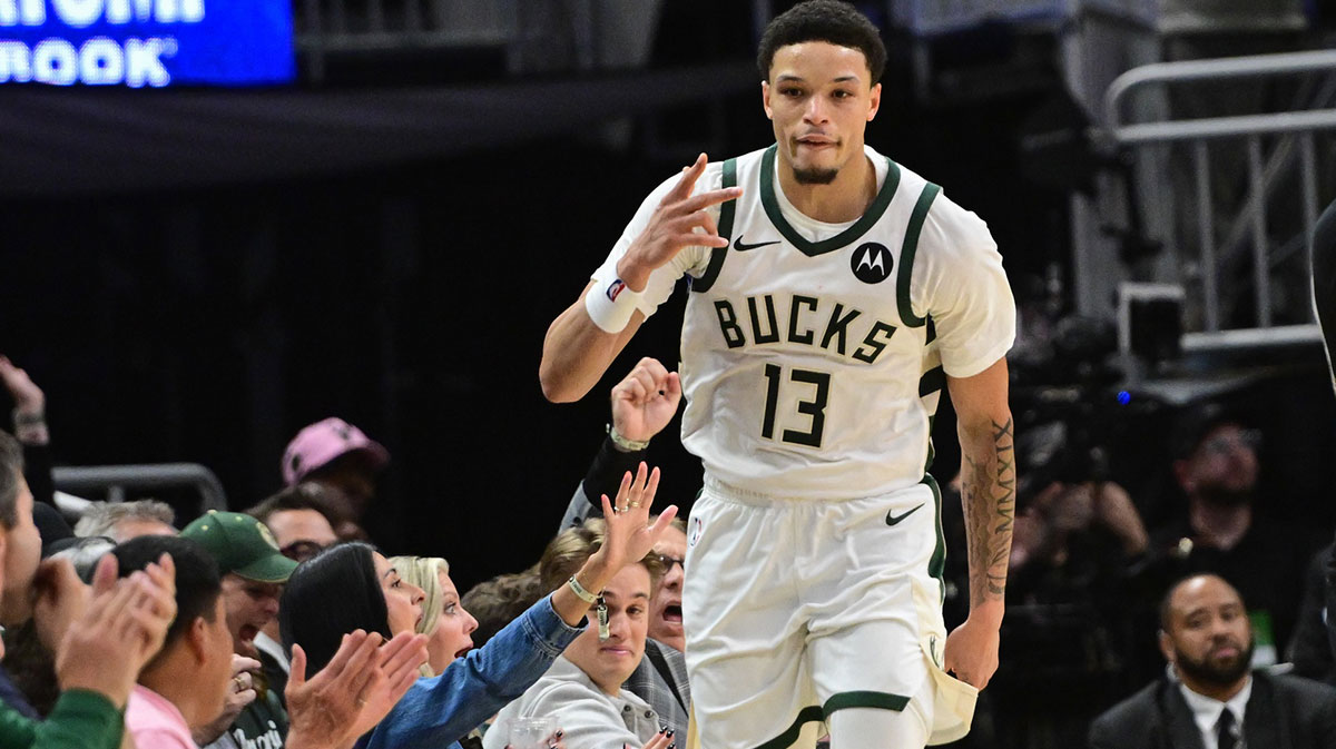 Milwaukee Bucks guard Ryan Rollins (13) reacts after scoring a 3-point basket in the 3rd quarter against the New York Knicks at Fiserv Forum.