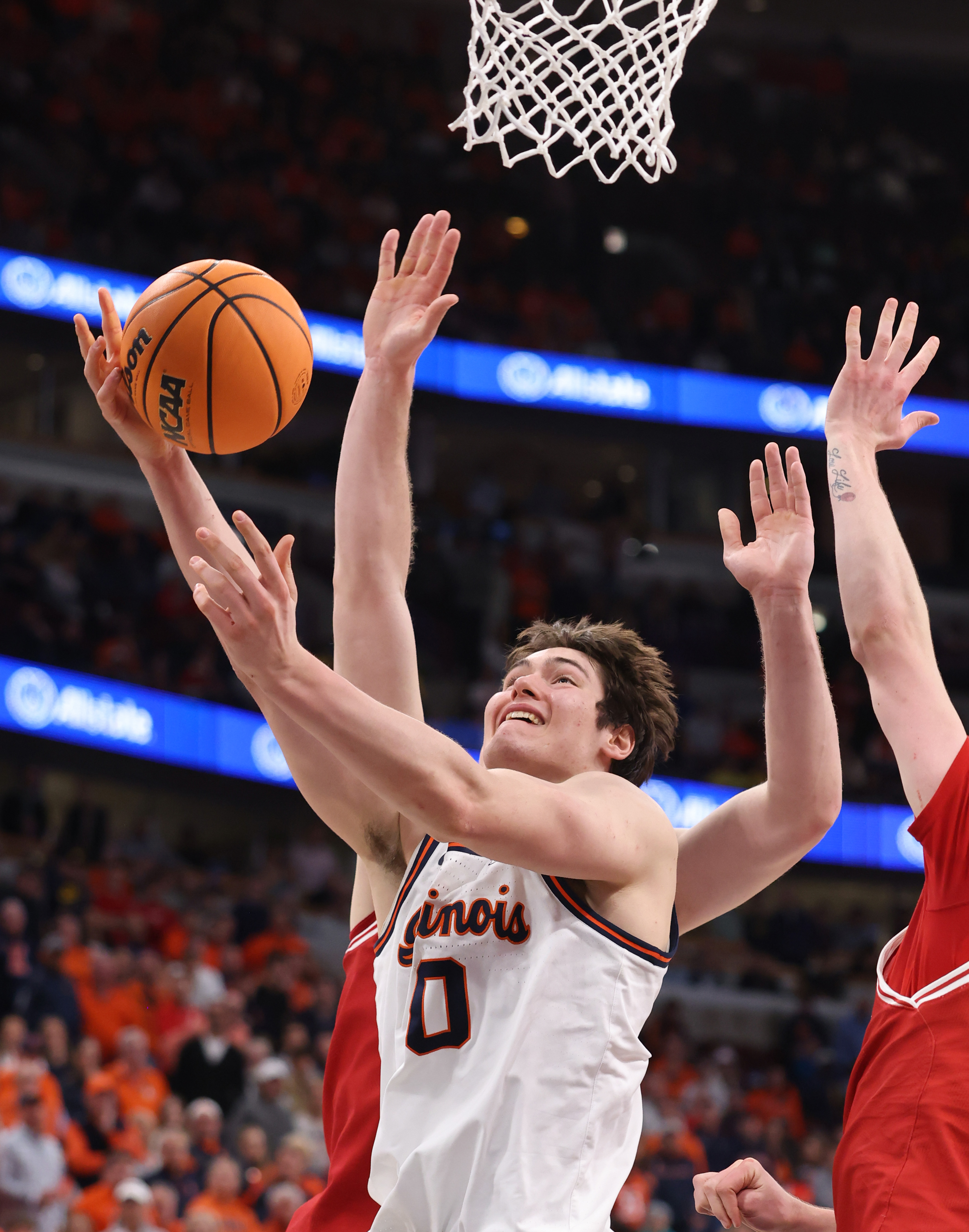 Illinois forward David MirkoviÄ (0) aims for the basket in...