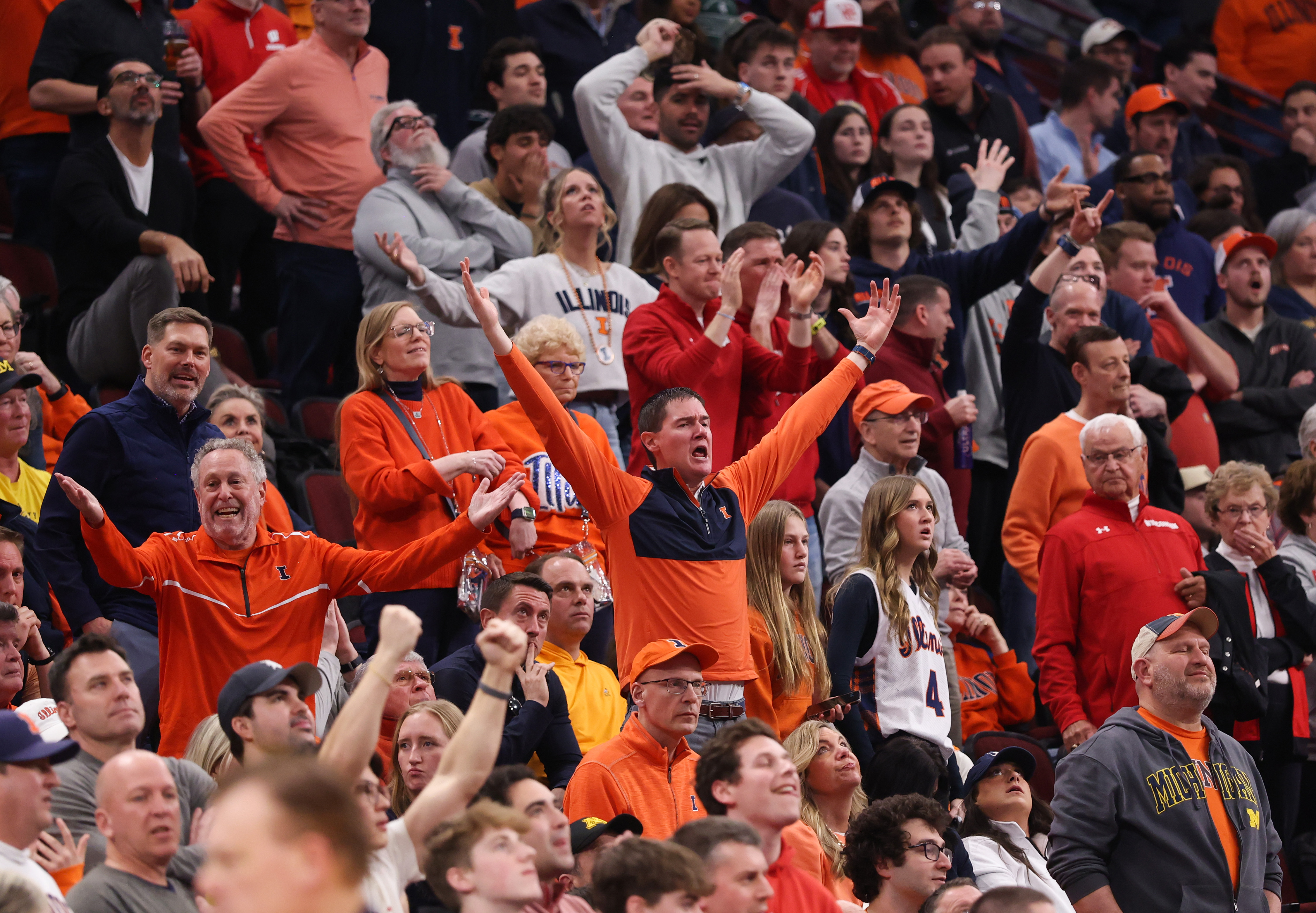 Illinois fans show frustration over the officiating in overtime of...