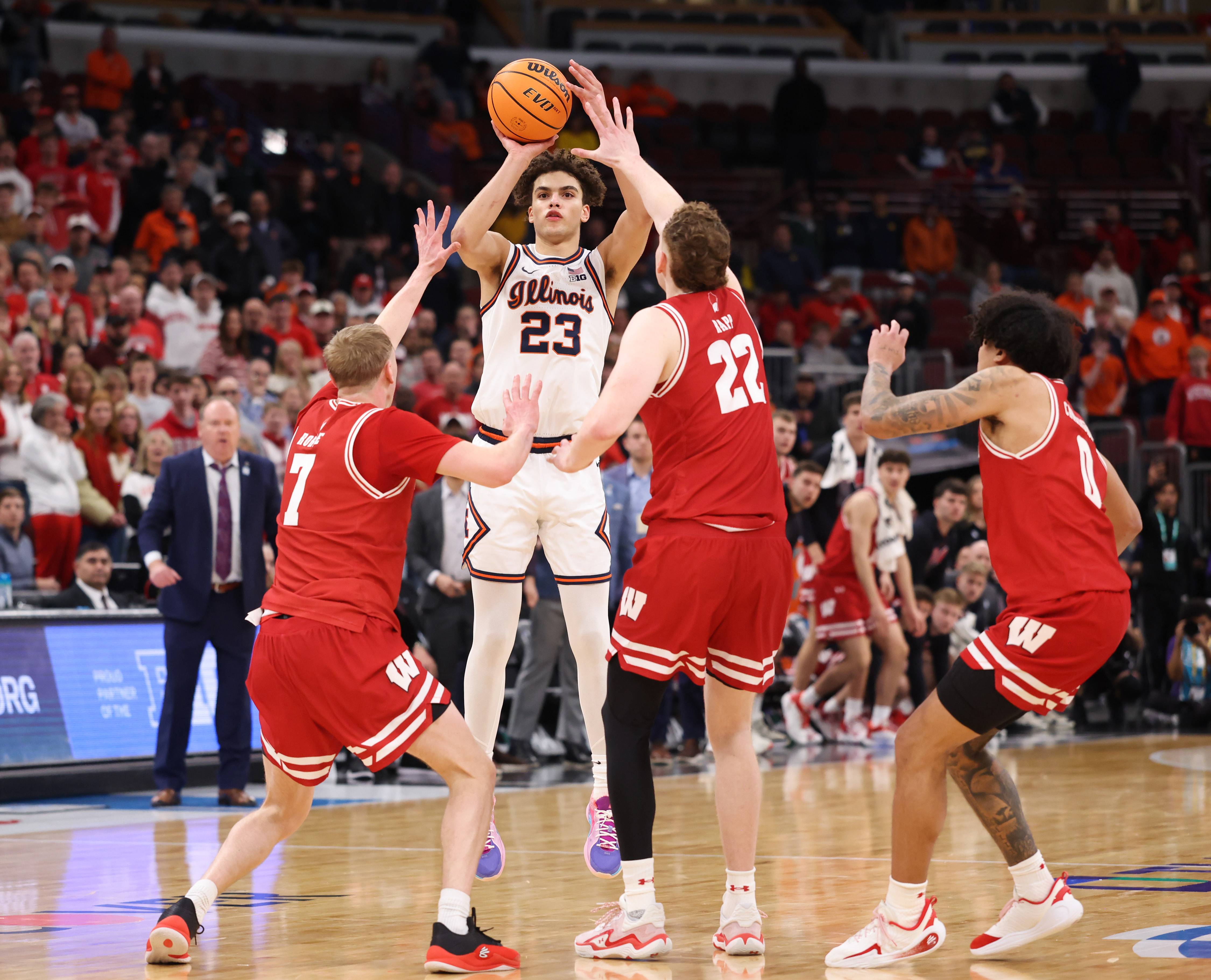 Illinois guard Keaton Wagler (23) makes the final shot attempt...