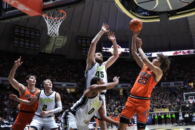Illinois guard Keaton Wagler takes a shot over Purdue's Oscar Cluff on Jan. 24, 2026, at Mackey Arena in West Lafayette, Ind. (Justin Casterline/Getty)