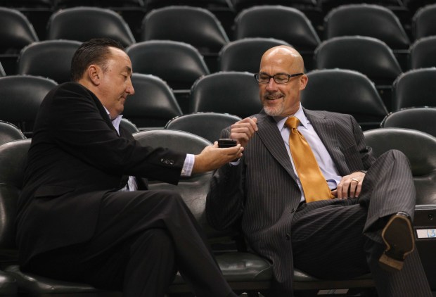 Bulls general manager Gar Forman, left, and executive vice president of basketball operations John Paxson talk before a game against the Pacers on Oct. 5, 2013, in Indianapolis. (Nuccio DiNuzzo/Chicago Tribune)