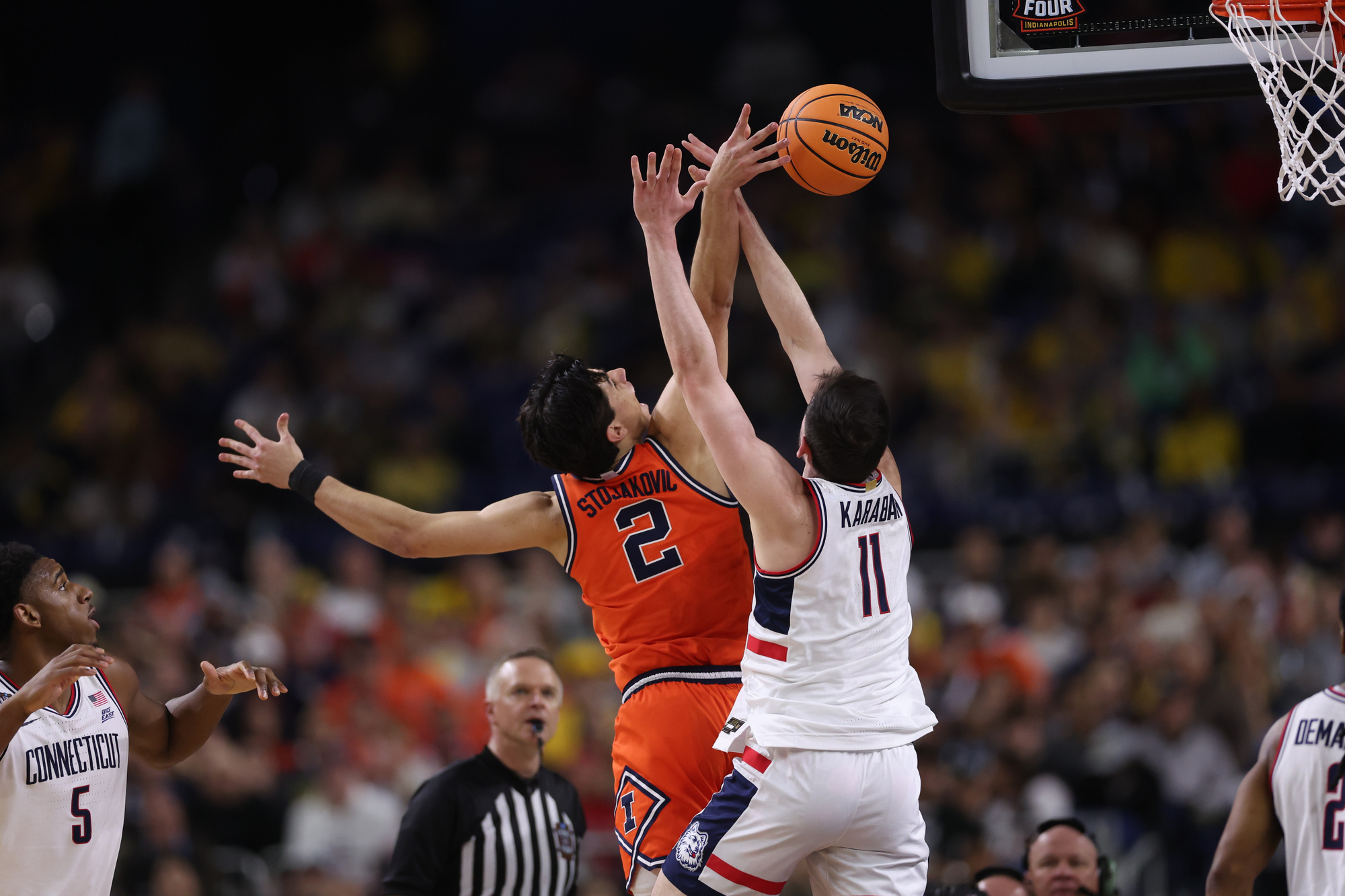 Illinois guard Andrej StojakoviÄ (2) shoots over UConn forward Alex...