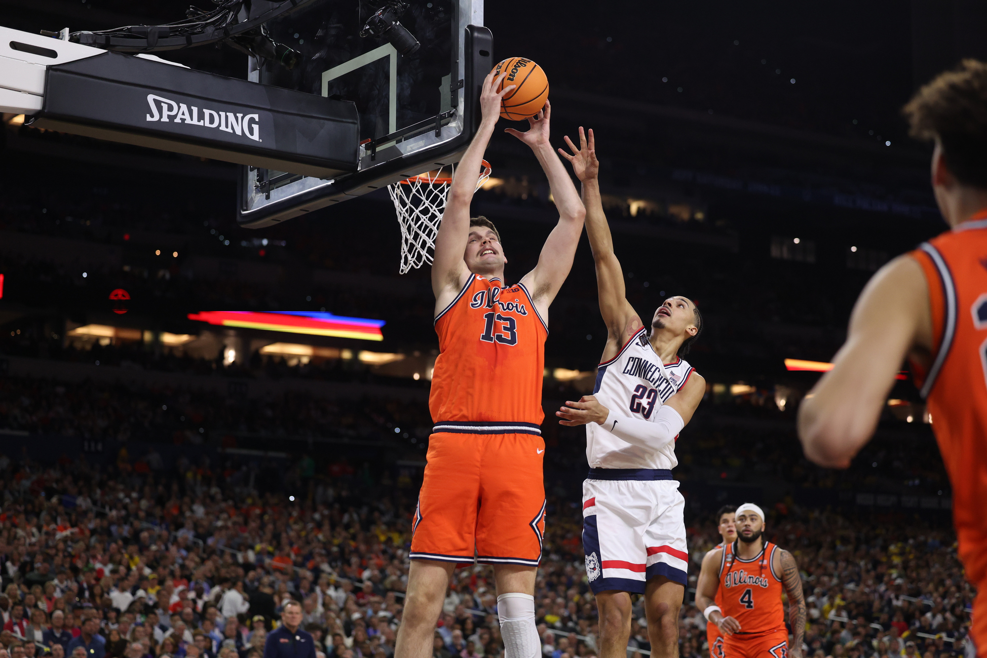 Illinois center Tomislav IviÅ¡iÄ (13) catches a pass in front...