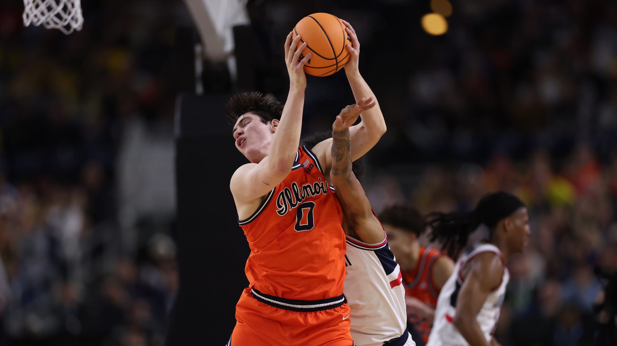UConn forward Jaylin Stewart fouls Illinois forward David MirkoviÄ in...