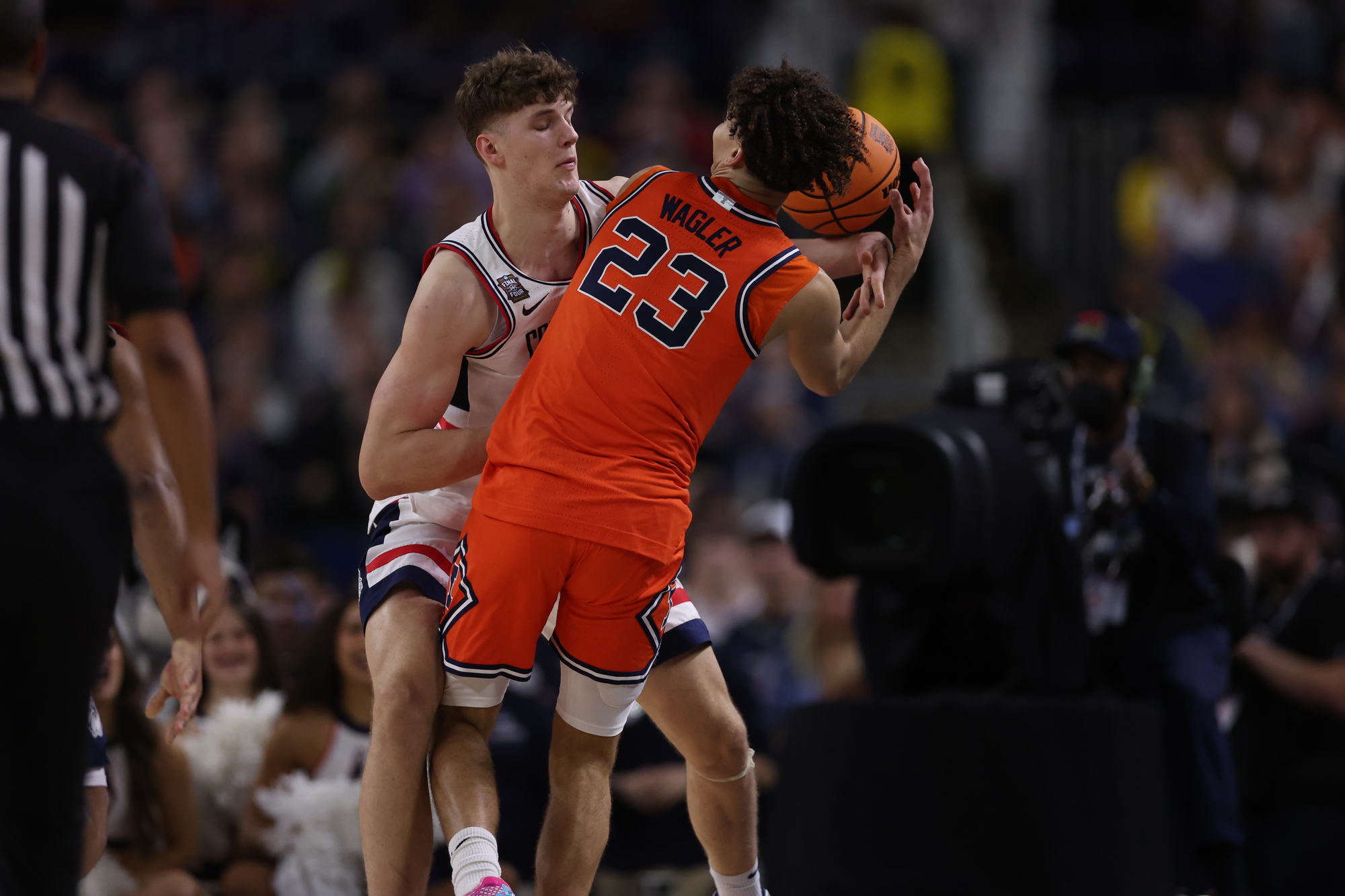 Illinois Fighting Illini guard Keaton Wagler (23) works against UConn...