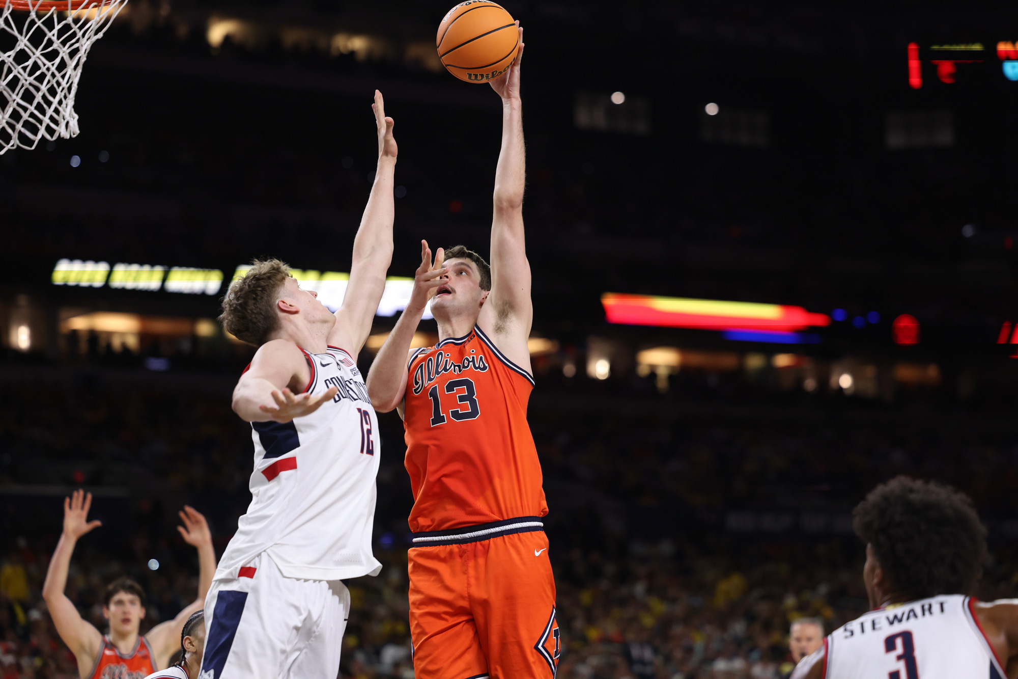 Illinois center Tomislav IviÅ¡iÄ (13) shoots over UConn center Eric...